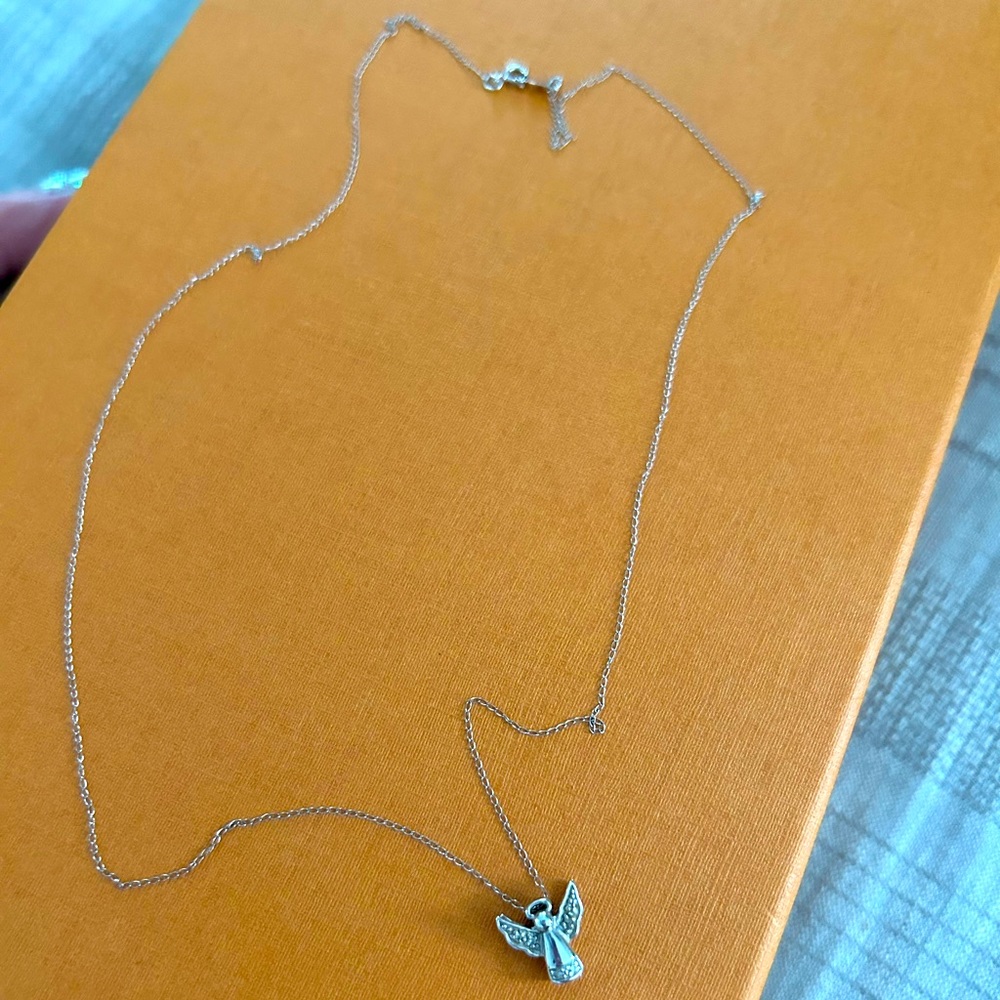 Diamond & white gold angel necklace